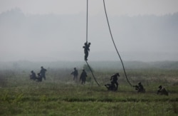 Военнослужащие польской 25-й бригады "воздушной кавалерии" на учениях. 24 мая 2022 года