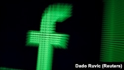 A 3D-printed Facebook logo in binary digits - generic