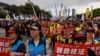 Activists gather outside the Presidential Office during an annual May Day demonstration in Taipei